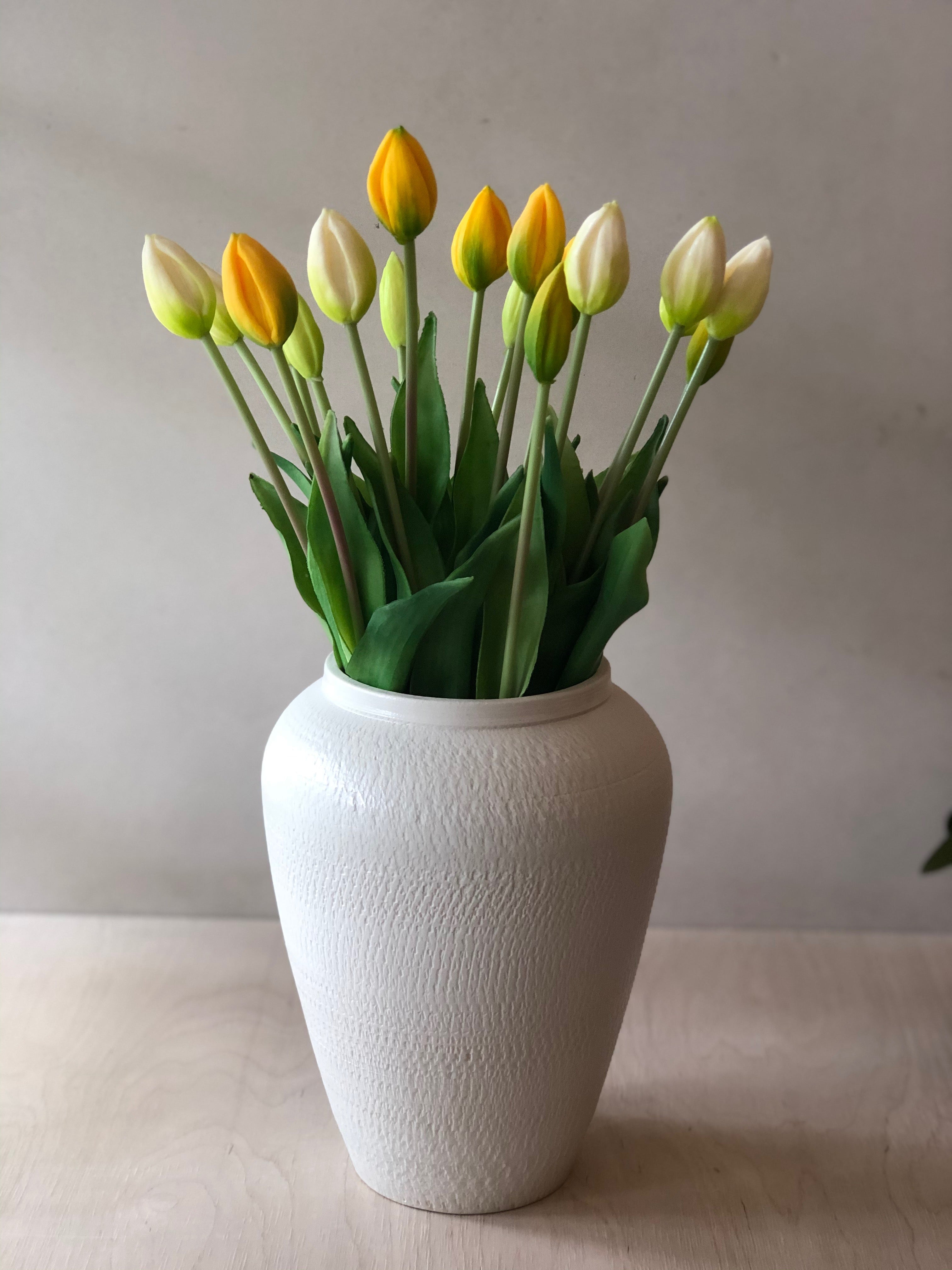 Large white vase with chattering decoration