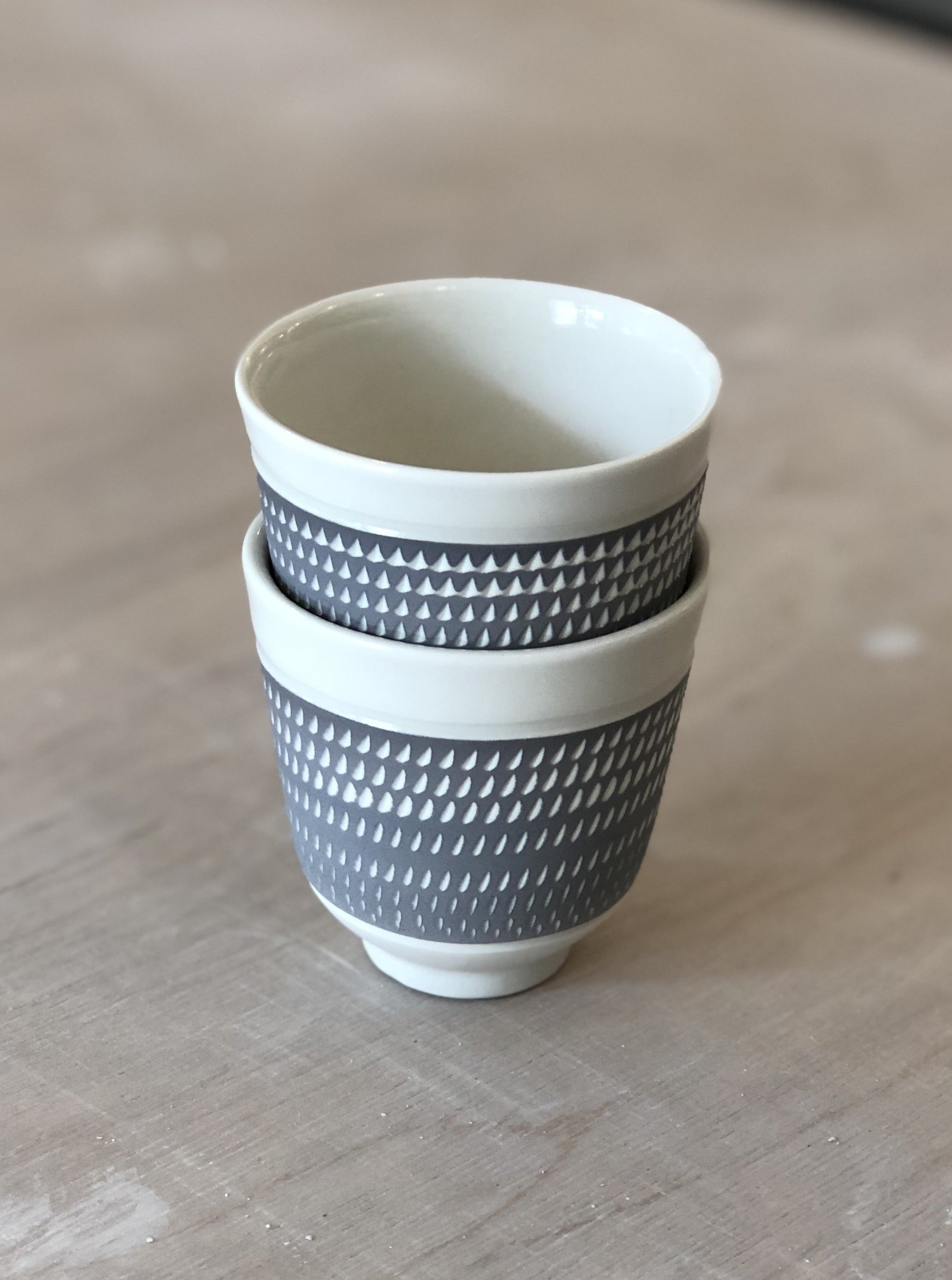 Porcelain cup with chattering decoration /  Lime