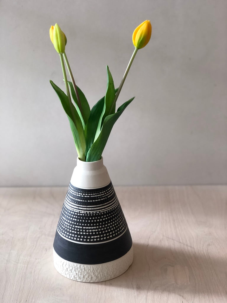Tall Black pyramid vase with chattering decoration